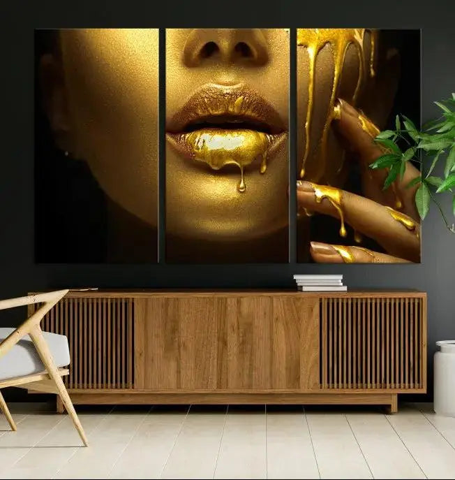 The Gold and Women Wall Art Canvas Print, with its exquisite golden depiction of a face and hand, elegantly adorns the space, bringing luxurious gold accents to this stylish living room.