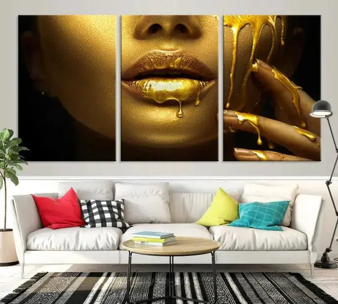 The Gold and Women Wall Art Canvas Print, with its exquisite golden depiction of a face and hand, elegantly adorns the space, bringing luxurious gold accents to this stylish living room.