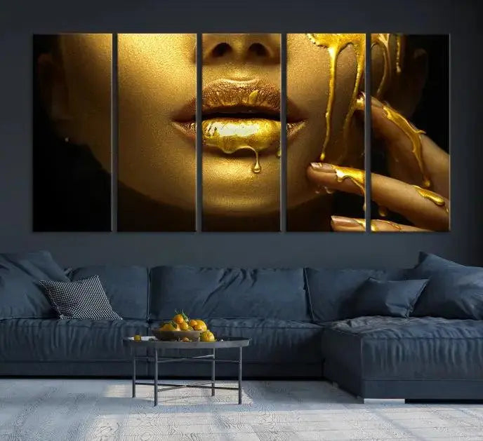 The Gold and Women Wall Art Canvas Print, with its exquisite golden depiction of a face and hand, elegantly adorns the space, bringing luxurious gold accents to this stylish living room.