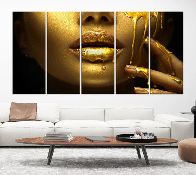 The Gold and Women Wall Art Canvas Print, with its exquisite golden depiction of a face and hand, elegantly adorns the space, bringing luxurious gold accents to this stylish living room.