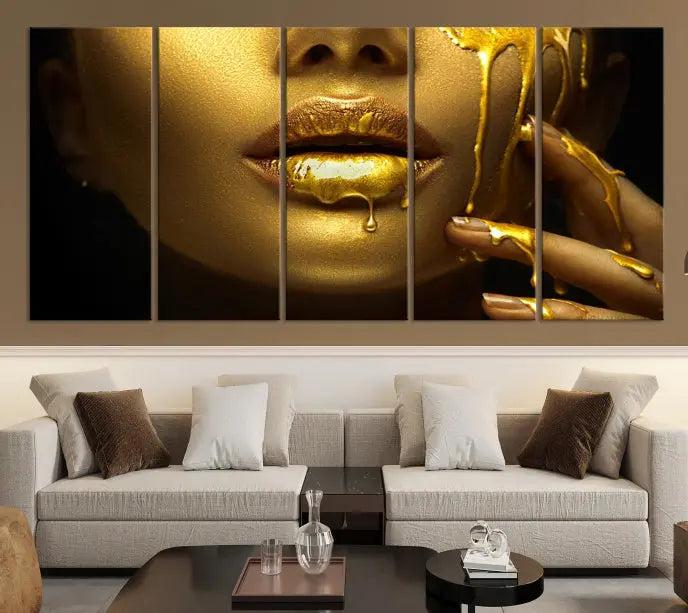 The Gold and Women Wall Art Canvas Print, with its exquisite golden depiction of a face and hand, elegantly adorns the space, bringing luxurious gold accents to this stylish living room.