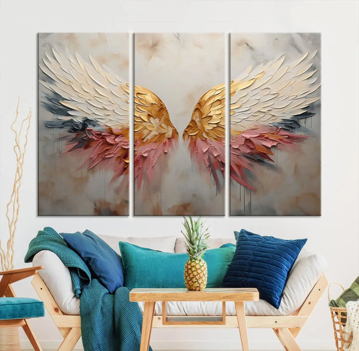 The "Golden Angel Wings Wall Art Canvas Print – Stunning Abstract Winged Art for Elegant Home Decor – Ready to Hang" adorns the dark wall above, showcasing an elegant triptych with abstract gold and pink hues.