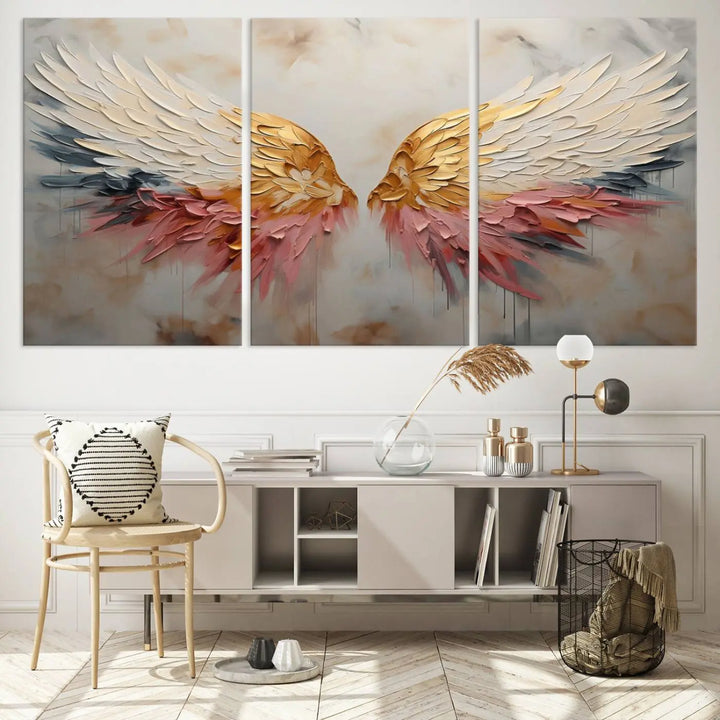 The "Golden Angel Wings Wall Art Canvas Print – Stunning Abstract Winged Art for Elegant Home Decor – Ready to Hang" adorns the dark wall above, showcasing an elegant triptych with abstract gold and pink hues.