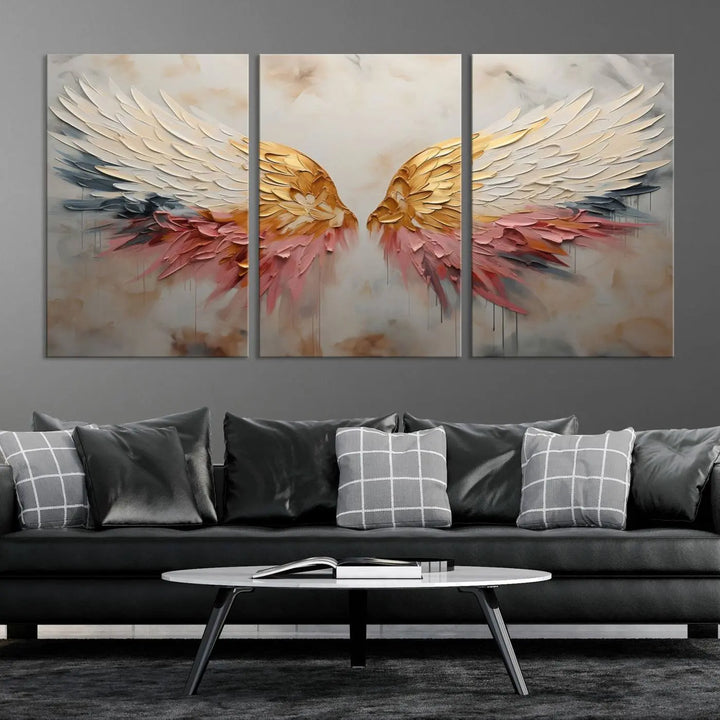 The "Golden Angel Wings Wall Art Canvas Print – Stunning Abstract Winged Art for Elegant Home Decor – Ready to Hang" adorns the dark wall above, showcasing an elegant triptych with abstract gold and pink hues.