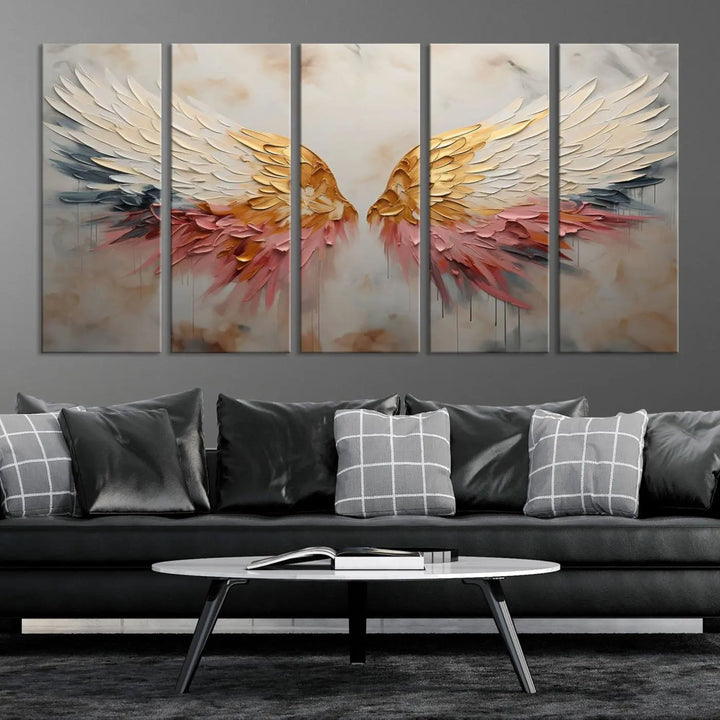 The "Golden Angel Wings Wall Art Canvas Print – Stunning Abstract Winged Art for Elegant Home Decor – Ready to Hang" adorns the dark wall above, showcasing an elegant triptych with abstract gold and pink hues.