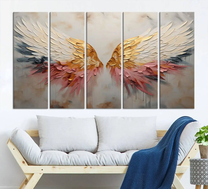 The "Golden Angel Wings Wall Art Canvas Print – Stunning Abstract Winged Art for Elegant Home Decor – Ready to Hang" adorns the dark wall above, showcasing an elegant triptych with abstract gold and pink hues.