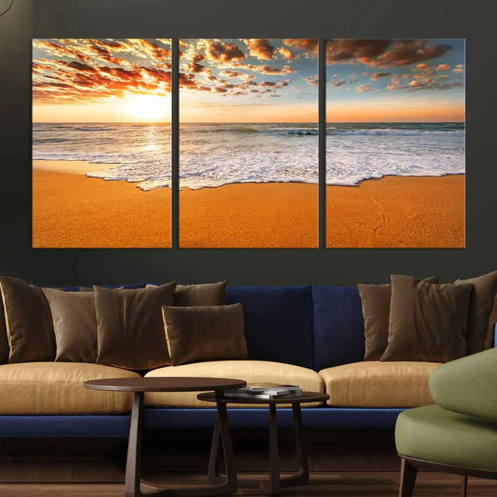 A Golden Beach Sunset Canvas Art, featuring an orange sky and fluffy clouds, perfectly captures the essence of ocean waves in coastal home decor.