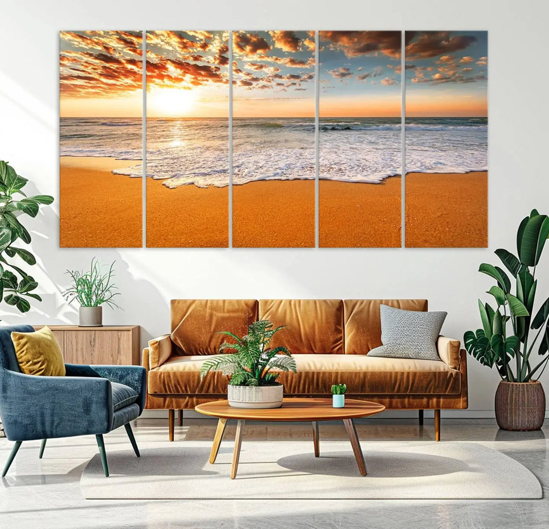 A Golden Beach Sunset Canvas Art, featuring an orange sky and fluffy clouds, perfectly captures the essence of ocean waves in coastal home decor.