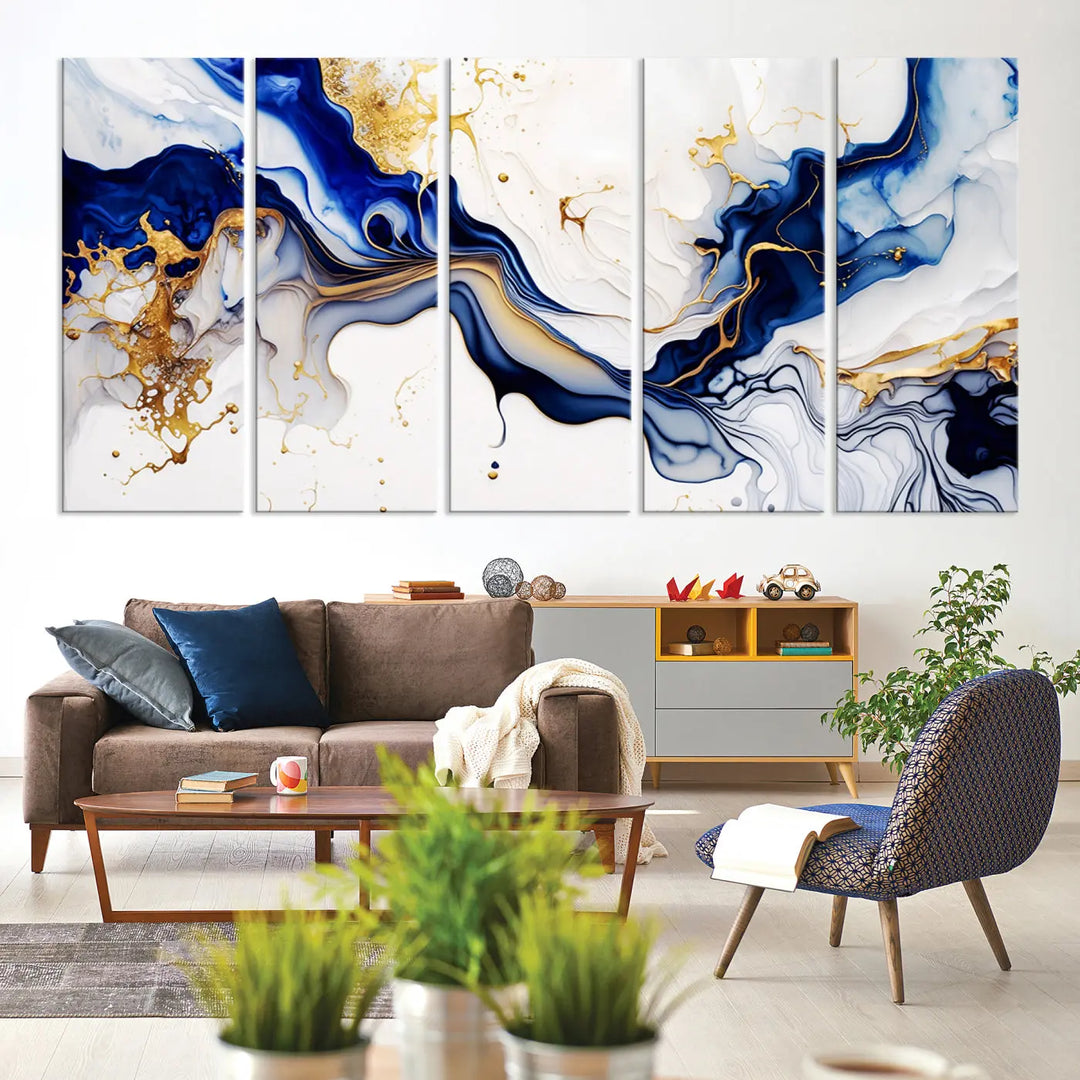 Enhance your modern home decor with the "Golden Cascades on Midnight Blue – Abstract Flowing Elegance" wall art canvas. This stunning piece features dynamic blue, gold, and white patterns. The triptych design comes framed and ready to hang, infusing any space with artistic expression.