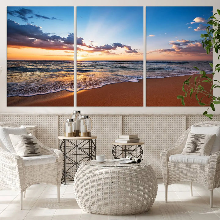 A Golden Hour Beach Sunset wall art canvas print decorates the wall in the bright room.