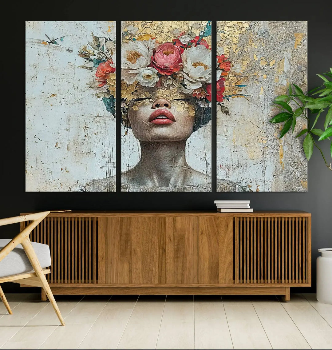 A triptych of the Golden Petal Silhouette Woman Wall Art Canvas Print showcases an abstract portrait featuring a woman adorned with flowers on her head.