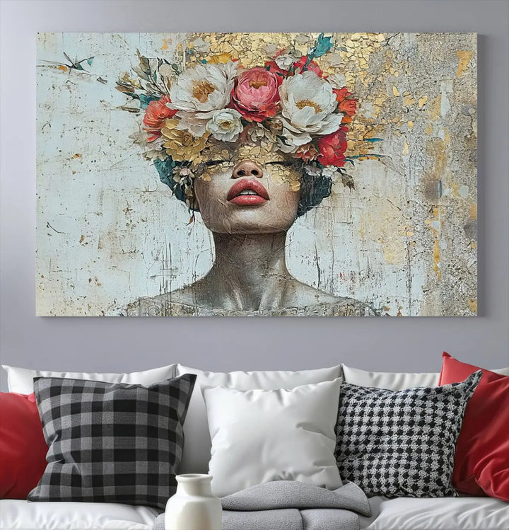 A triptych of the Golden Petal Silhouette Woman Wall Art Canvas Print showcases an abstract portrait featuring a woman adorned with flowers on her head.