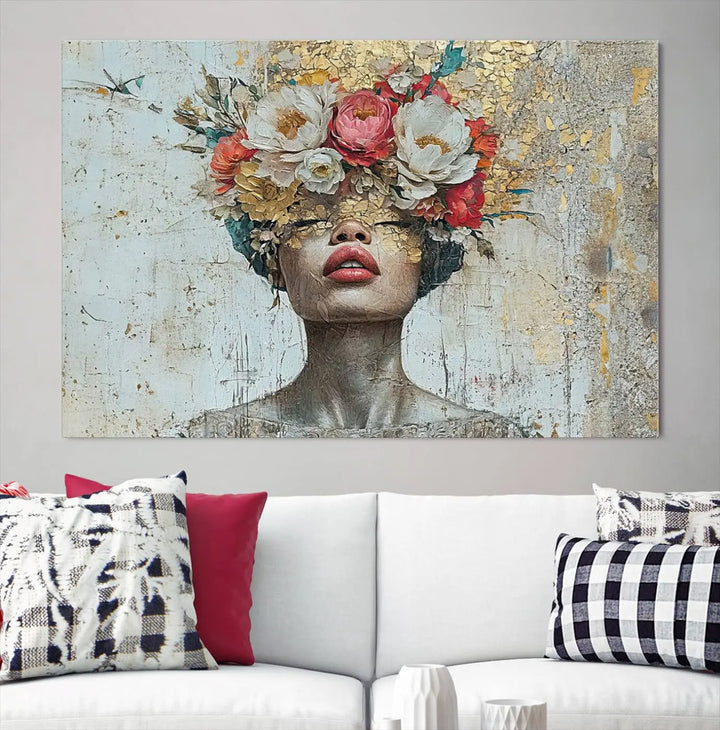 A triptych of the Golden Petal Silhouette Woman Wall Art Canvas Print showcases an abstract portrait featuring a woman adorned with flowers on her head.