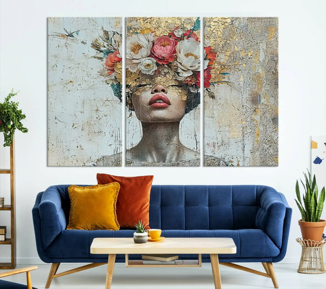 A triptych of the Golden Petal Silhouette Woman Wall Art Canvas Print showcases an abstract portrait featuring a woman adorned with flowers on her head.