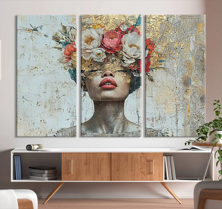 A triptych of the Golden Petal Silhouette Woman Wall Art Canvas Print showcases an abstract portrait featuring a woman adorned with flowers on her head.