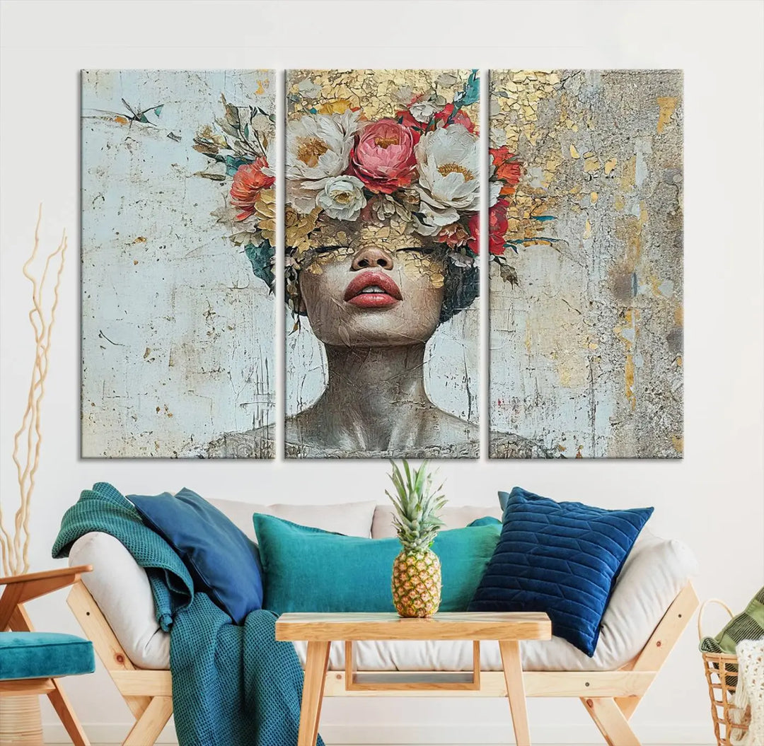 A triptych of the Golden Petal Silhouette Woman Wall Art Canvas Print showcases an abstract portrait featuring a woman adorned with flowers on her head.