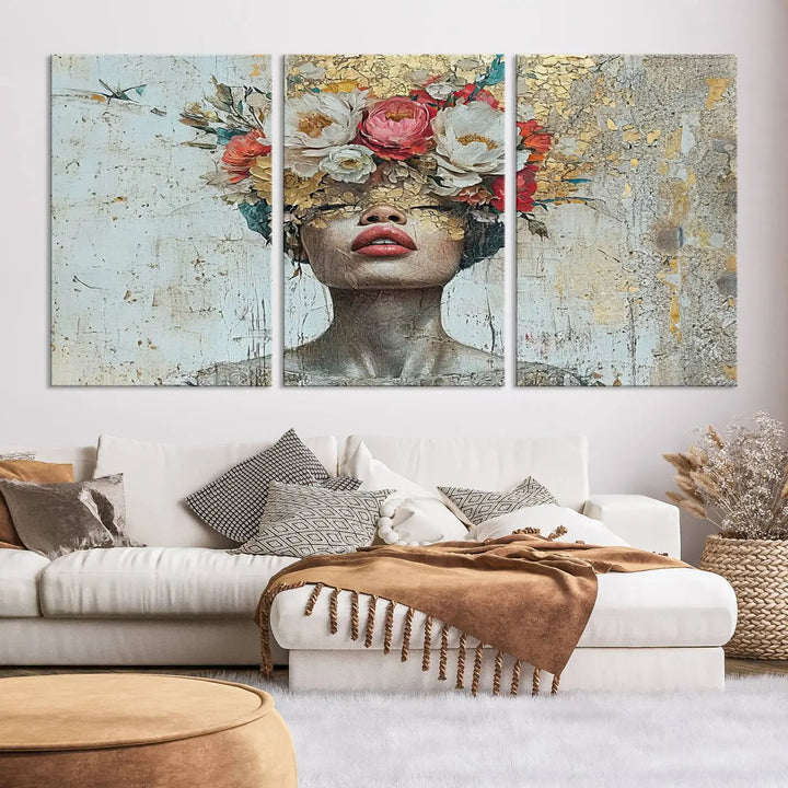 A triptych of the Golden Petal Silhouette Woman Wall Art Canvas Print showcases an abstract portrait featuring a woman adorned with flowers on her head.