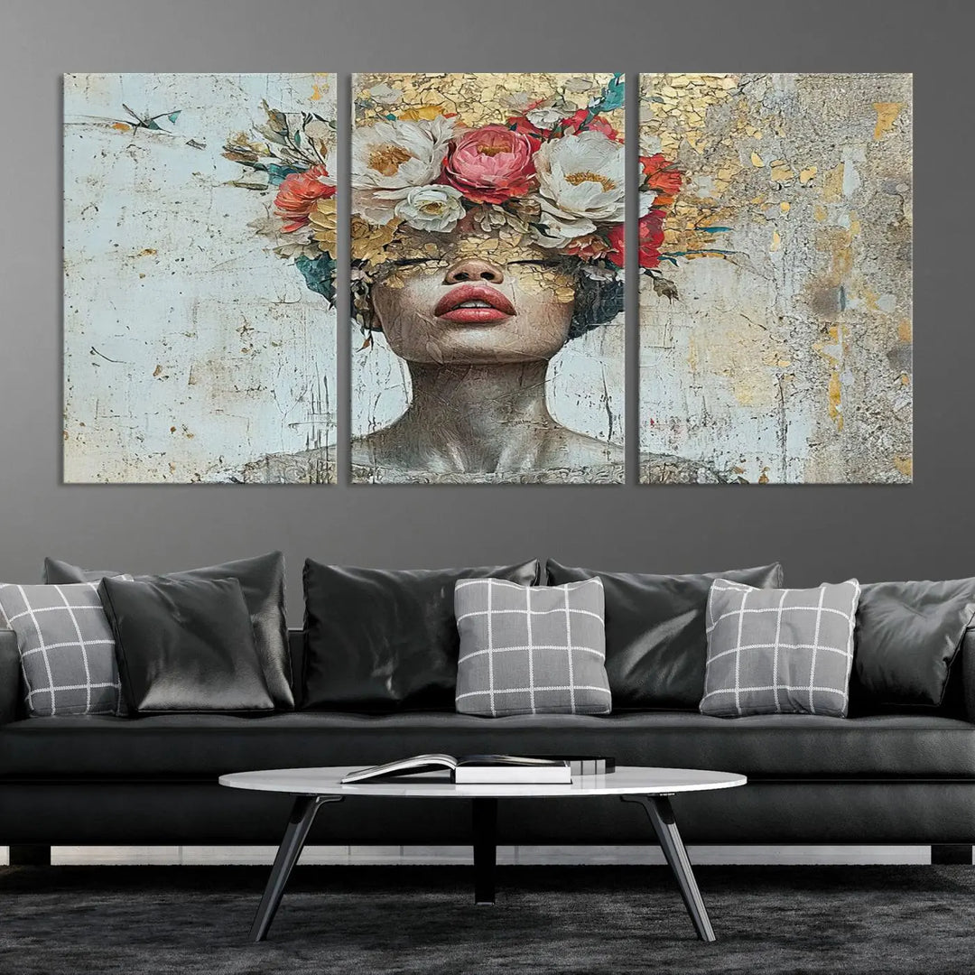 A triptych of the Golden Petal Silhouette Woman Wall Art Canvas Print showcases an abstract portrait featuring a woman adorned with flowers on her head.