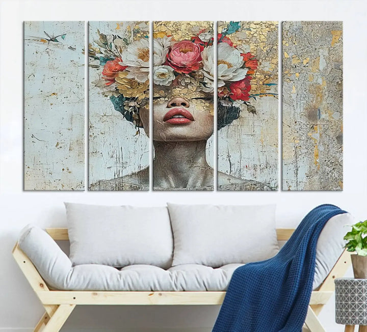 A triptych of the Golden Petal Silhouette Woman Wall Art Canvas Print showcases an abstract portrait featuring a woman adorned with flowers on her head.