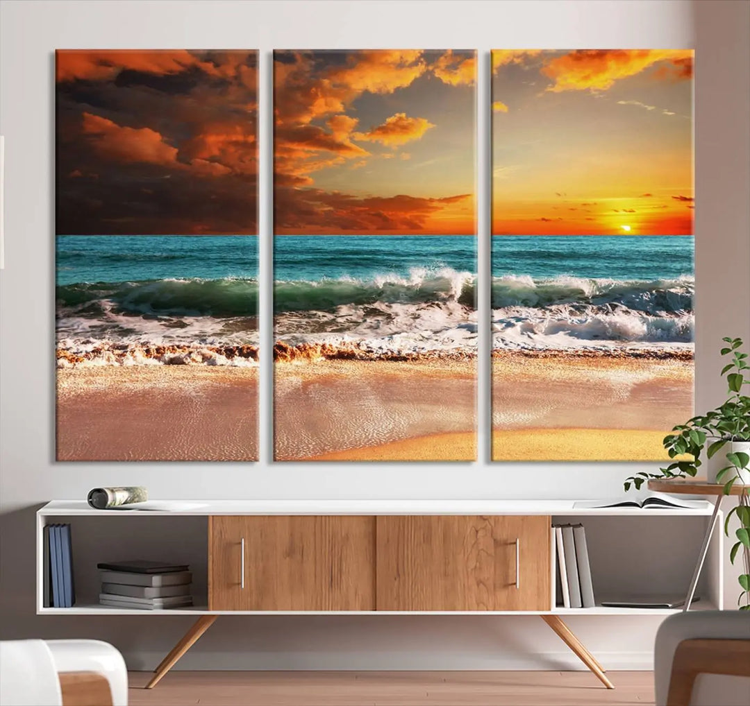 The living room features the stunning Golden Sunset Beach Canvas Wall Art—Triptych Seascape Print—framed and ready to hang on the wall.