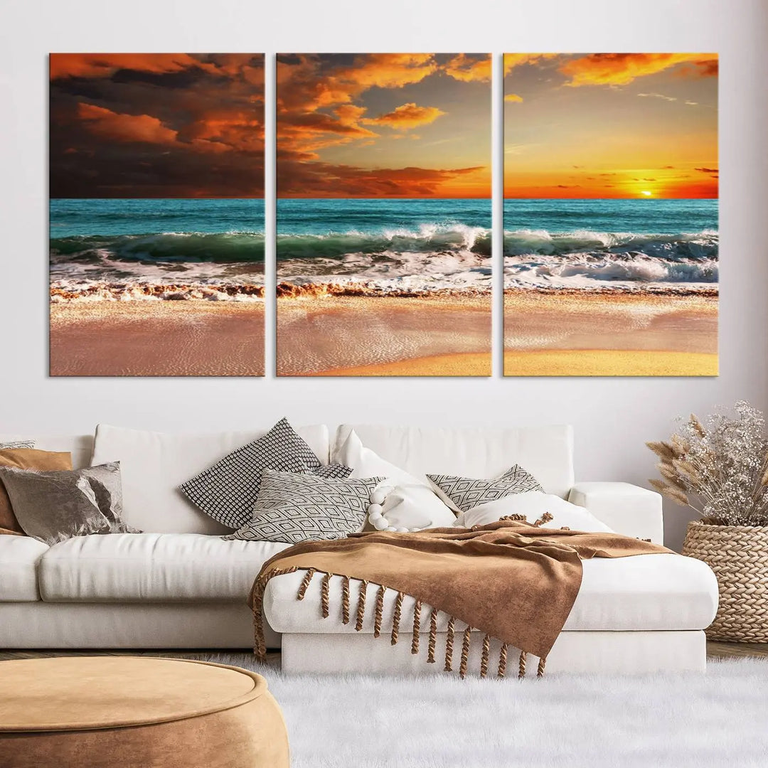 The living room features the stunning Golden Sunset Beach Canvas Wall Art—Triptych Seascape Print—framed and ready to hang on the wall.