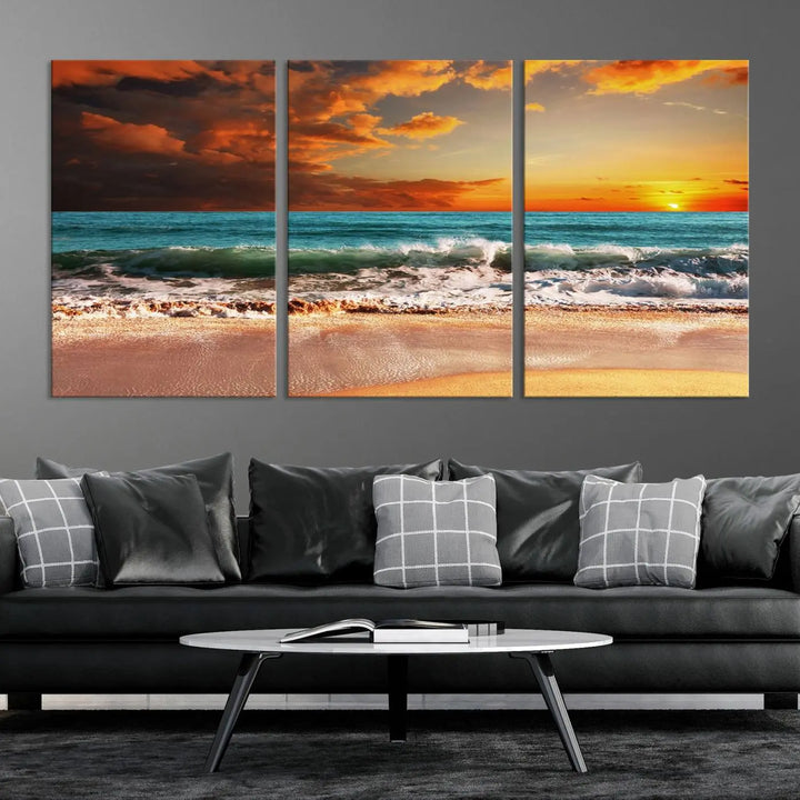 The living room features the stunning Golden Sunset Beach Canvas Wall Art—Triptych Seascape Print—framed and ready to hang on the wall.