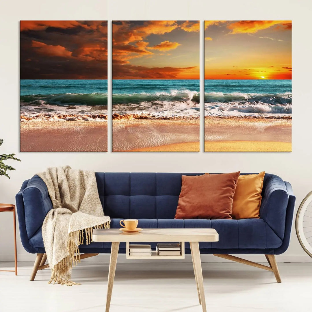 The living room features the stunning Golden Sunset Beach Canvas Wall Art—Triptych Seascape Print—framed and ready to hang on the wall.