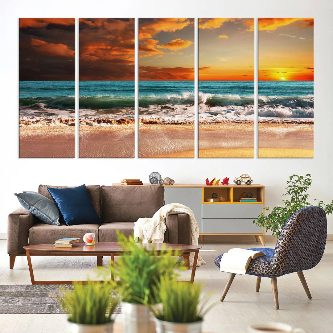 The living room features the stunning Golden Sunset Beach Canvas Wall Art—Triptych Seascape Print—framed and ready to hang on the wall.