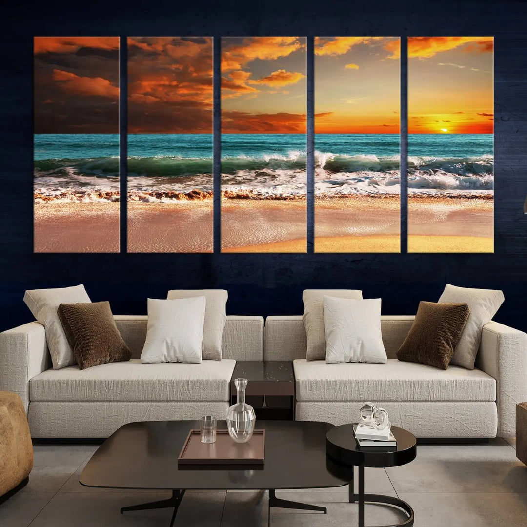 The living room features the stunning Golden Sunset Beach Canvas Wall Art—Triptych Seascape Print—framed and ready to hang on the wall.