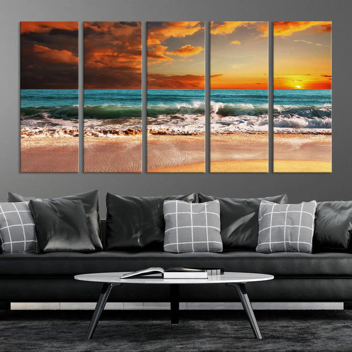 The living room features the stunning Golden Sunset Beach Canvas Wall Art—Triptych Seascape Print—framed and ready to hang on the wall.