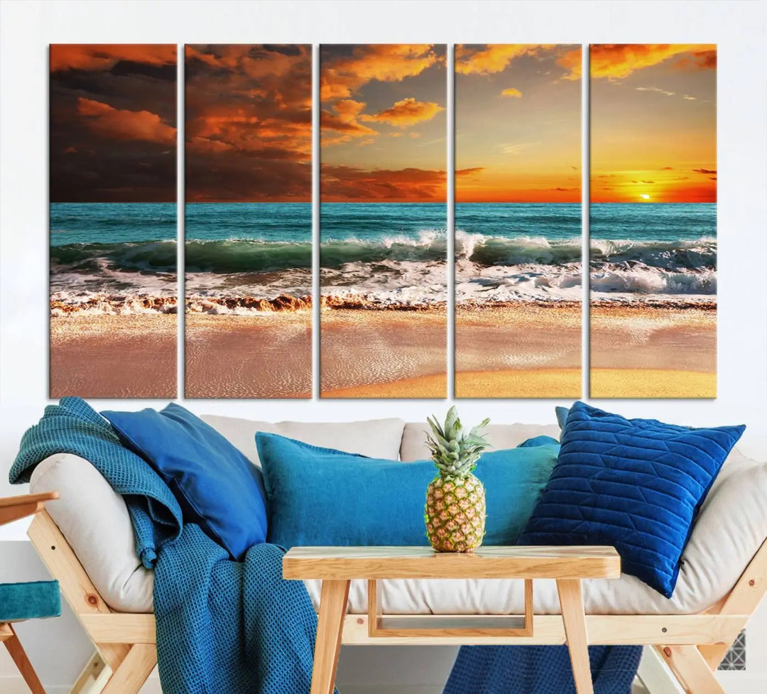 The living room features the stunning Golden Sunset Beach Canvas Wall Art—Triptych Seascape Print—framed and ready to hang on the wall.