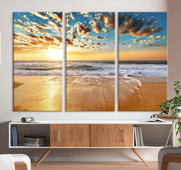 The "Golden Sunset Beach" triptych, a giclee canvas print showcasing Canon print quality, beautifully captures a serene beach sunset with waves lapping at the golden sand.