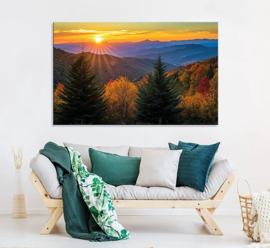 A living room featuring a Golden Sunset Over Mountain Forest canvas wall art.