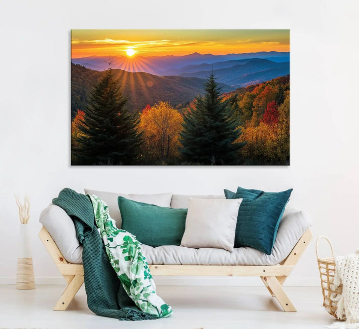 A living room featuring a Golden Sunset Over Mountain Forest canvas wall art.