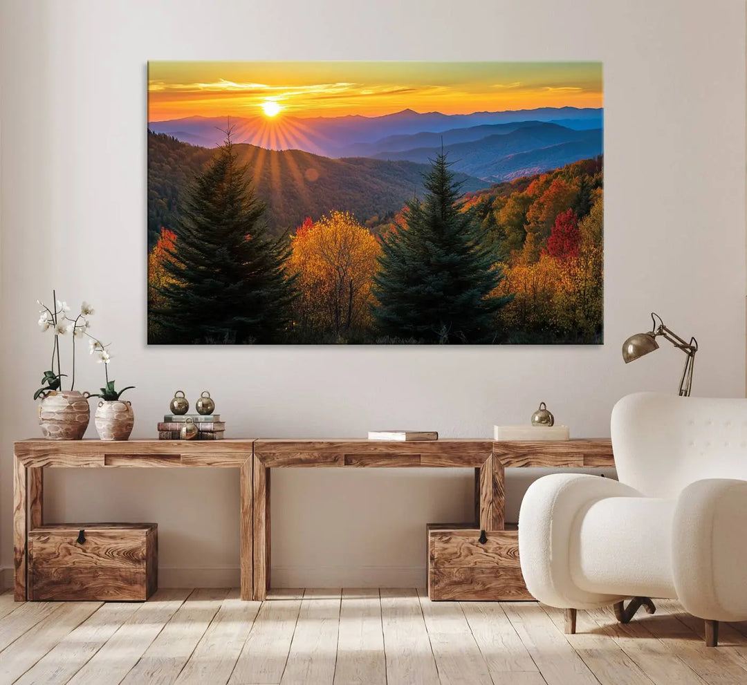 A living room featuring a Golden Sunset Over Mountain Forest canvas wall art.