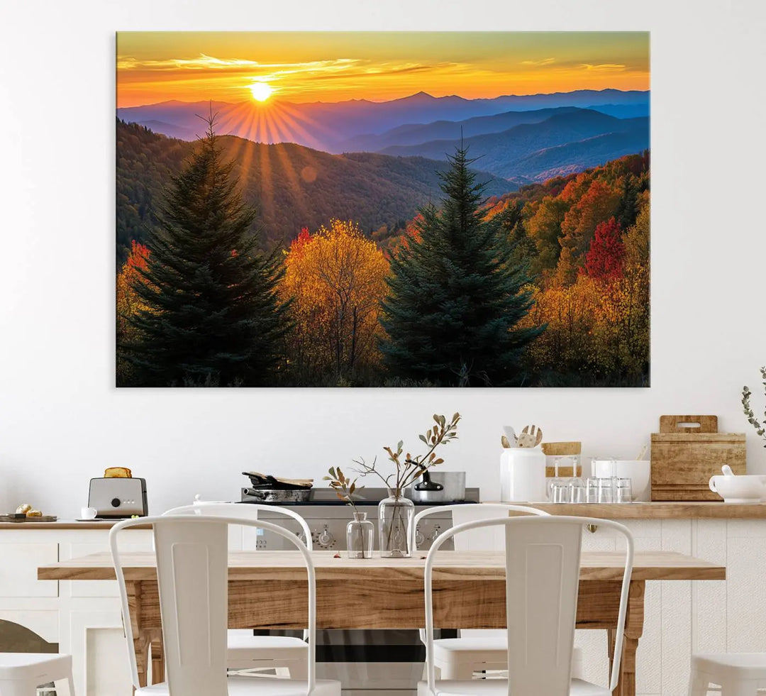 A living room featuring a Golden Sunset Over Mountain Forest canvas wall art.