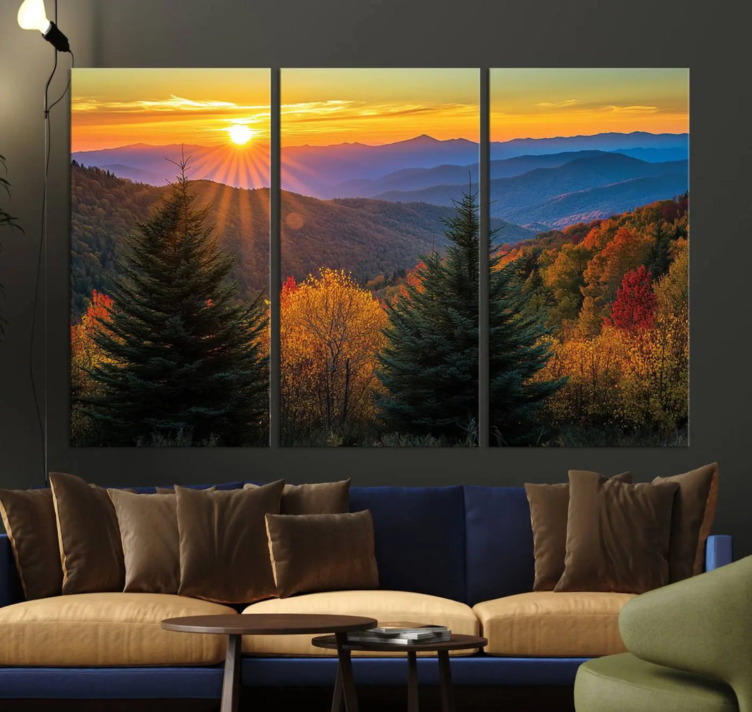 A living room featuring a Golden Sunset Over Mountain Forest canvas wall art.