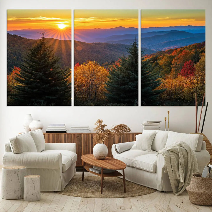 A living room featuring a Golden Sunset Over Mountain Forest canvas wall art.