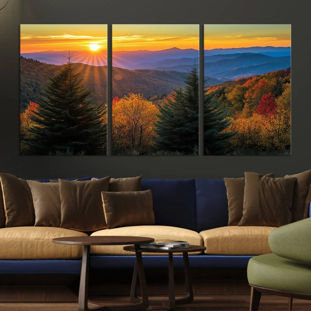 A living room featuring a Golden Sunset Over Mountain Forest canvas wall art.