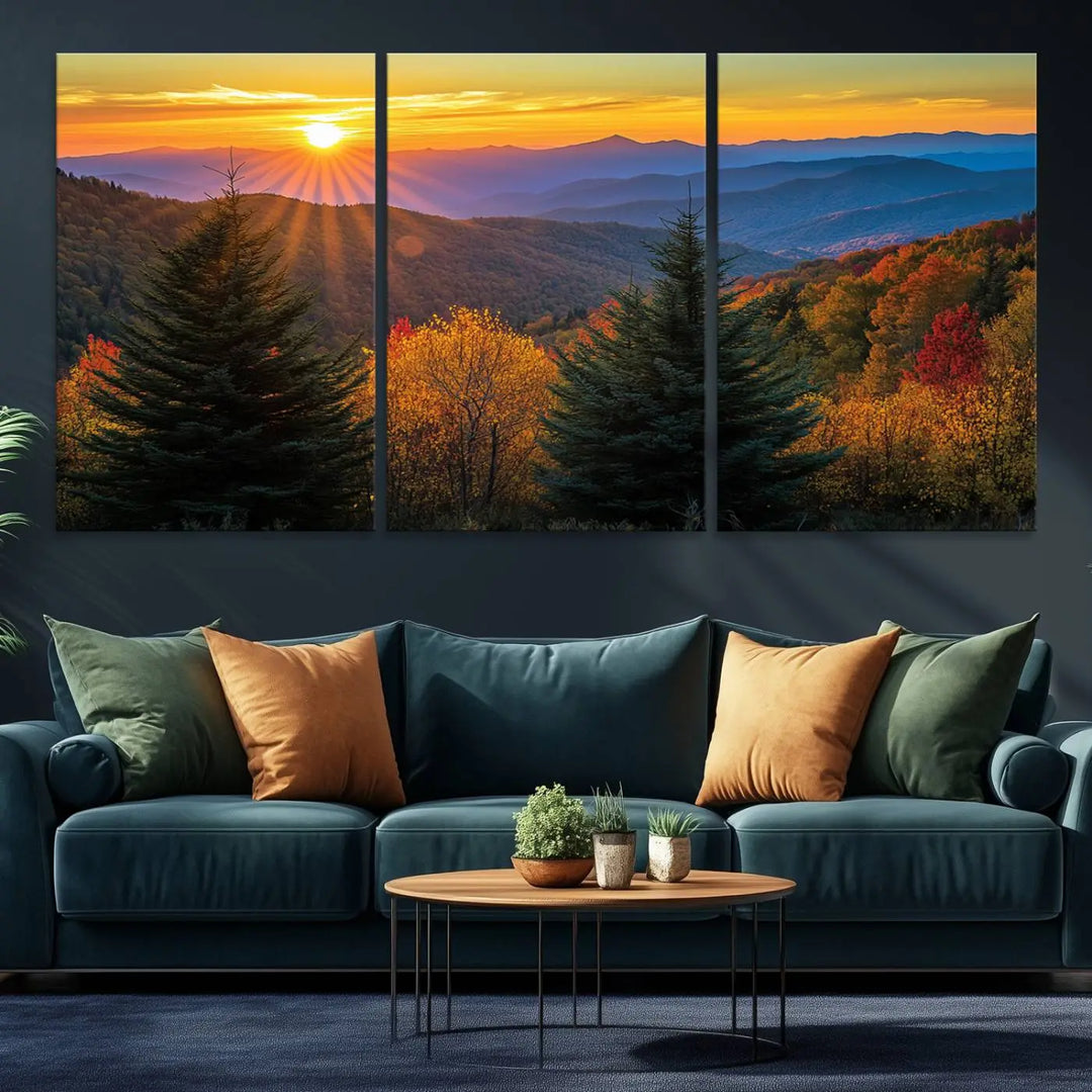 A living room featuring a Golden Sunset Over Mountain Forest canvas wall art.