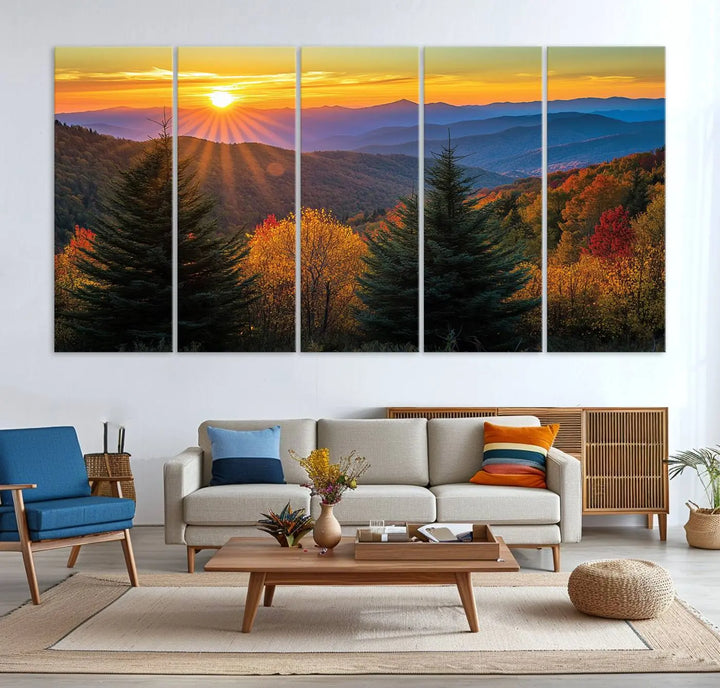 A living room featuring a Golden Sunset Over Mountain Forest canvas wall art.