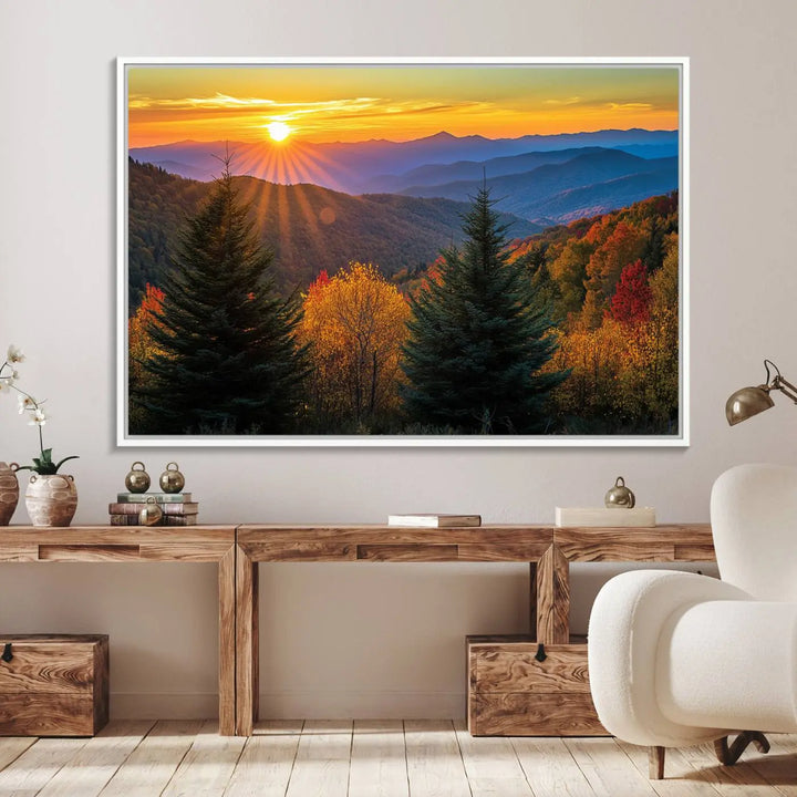 A living room featuring a Golden Sunset Over Mountain Forest canvas wall art.