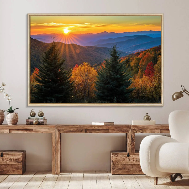 A living room featuring a Golden Sunset Over Mountain Forest canvas wall art.