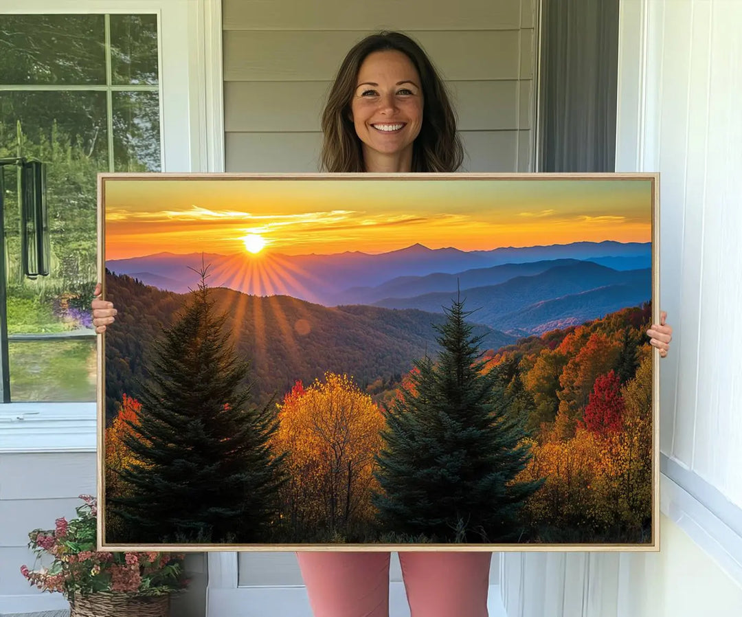 A living room featuring a Golden Sunset Over Mountain Forest canvas wall art.