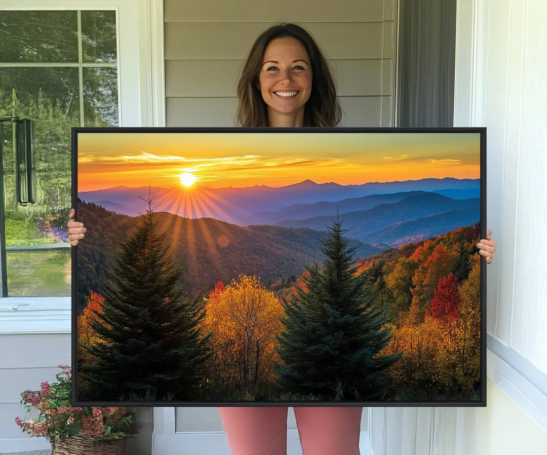 A living room featuring a Golden Sunset Over Mountain Forest canvas wall art.