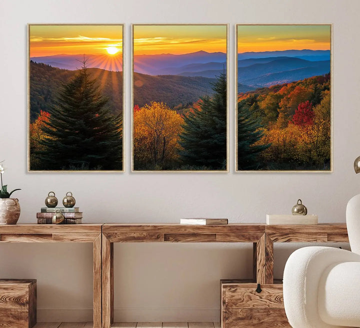 A living room featuring a Golden Sunset Over Mountain Forest canvas wall art.