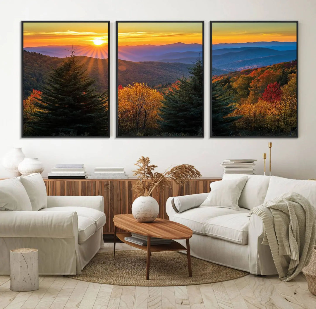 A living room featuring a Golden Sunset Over Mountain Forest canvas wall art.