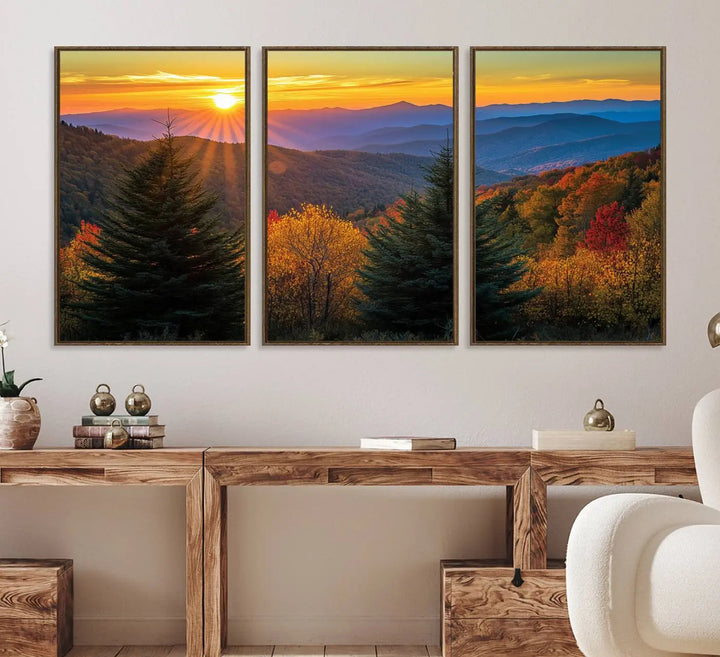 A living room featuring a Golden Sunset Over Mountain Forest canvas wall art.