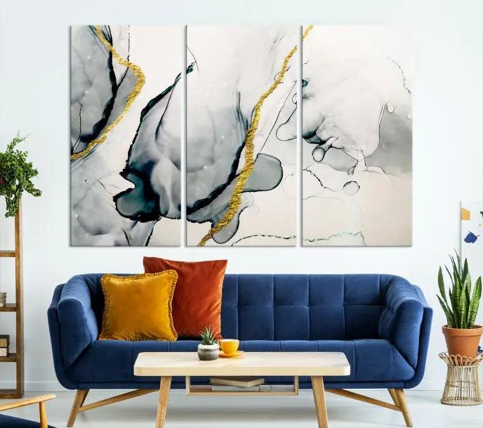 Gray Marble Fluid Effect Wall Art Abstract Canvas Wall Art Print features intricate gray and gold lines on museum-quality canvas. This ready-to-hang artwork includes a UV-protective coating to maintain its vibrant appearance.