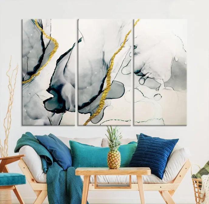 Gray Marble Fluid Effect Wall Art Abstract Canvas Wall Art Print features intricate gray and gold lines on museum-quality canvas. This ready-to-hang artwork includes a UV-protective coating to maintain its vibrant appearance.